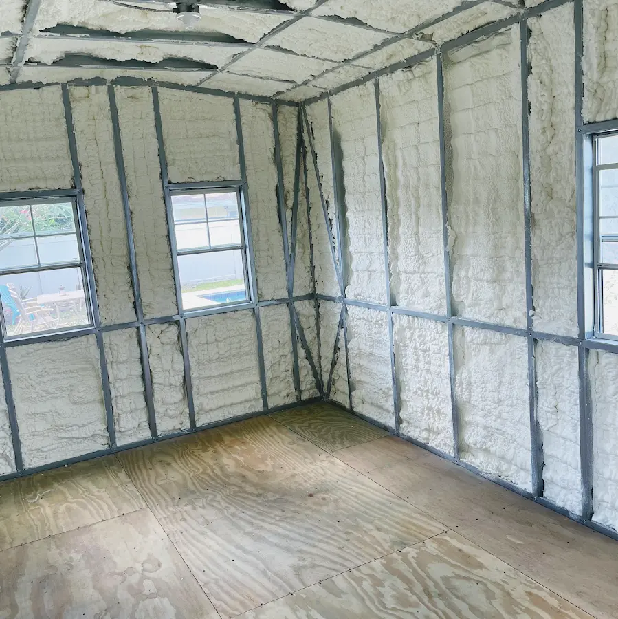 Closed-cell spray foam insulation applied to wall cavities in a residential project in Home Gardens